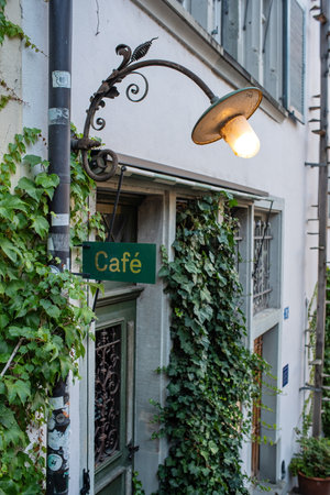 28-08-2024 Zurich, Switzerland. Cafe coffee shop street sign near Lindenplatz in the old city center, no people.のeditorial素材