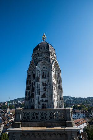 28-08-2024 Zurich, Switzerland. High view point of one of Grossmunster church towers as seen from the top viewing area of the second tower. Paid assess church attraction, famous visitor spotのeditorial素材