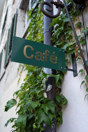 28-08-2024 Zurich, Switzerland. Cafe coffee shop street sign near Lindenplatz in the old city center, no people.のeditorial素材