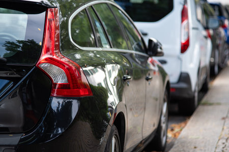 Generic car taillights or rear light cluster close up shot. Parked generic car, shallow depth of...