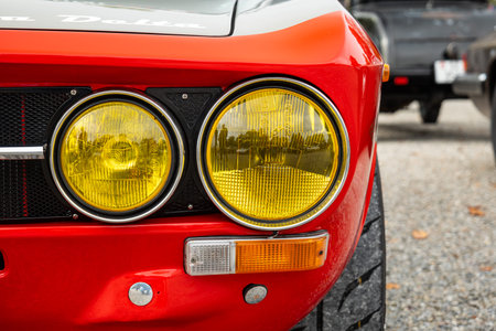 Yellowed out vintage car headlight or headlamp unit, specific to the French car market in the past....