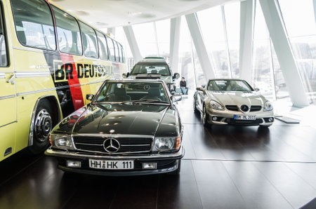 31-03-2018 Mercedes-Benz Museum, Stuttgart, Germany. 1980s R107 Hardy Kruger 500 SL roadster and a 2010s R171 SLK 55 AMGのeditorial素材
