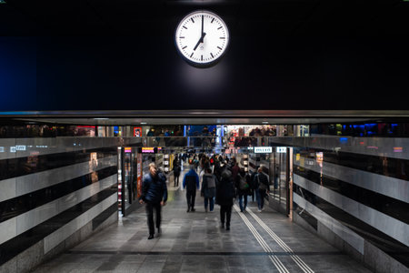 3-12-2024 Zurich, Switzerland. ShopVille. Blurred crowds of people moving through an underground shopping corridor at the main train station..のeditorial素材