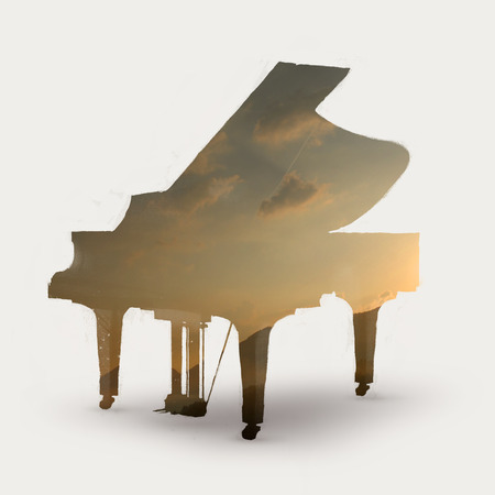 Double exposure illustration of piano and sunsetの写真素材