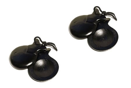 Two pair of castanets, small hand-held percussion indtruments are used in Spanish, Latin American, Italian music.の写真素材