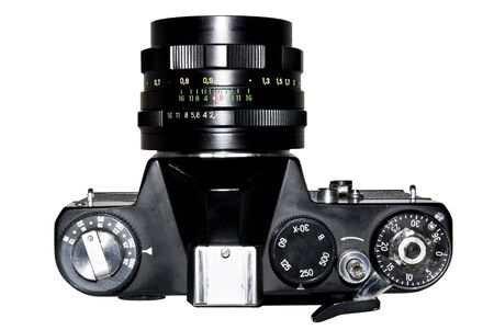 An old russian semi-automatic 35mm film SLR camera over white.の写真素材