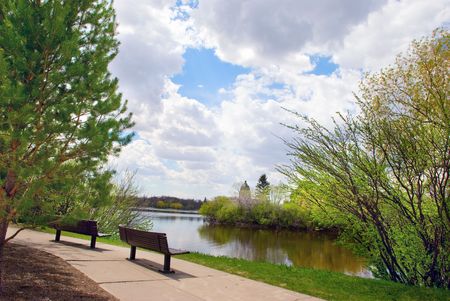 Two empty benches in the city parkの写真素材