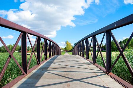 A little pedestrian bridge of the city parkの写真素材