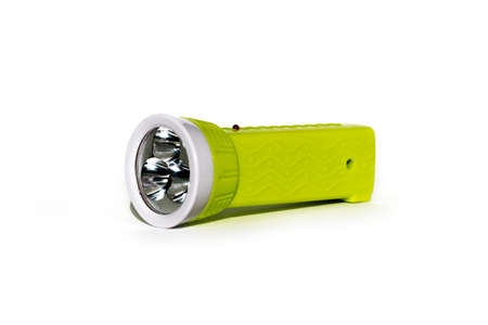 Green flashlight isolated on white backgroundの写真素材