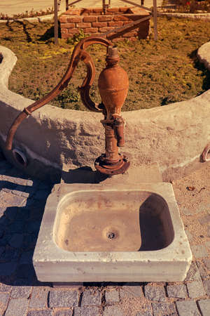 Old vintage antique water pumpの写真素材