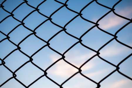 blue sky and wire fencesの写真素材