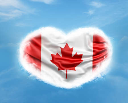 Canada flag inside heart in skyの写真素材