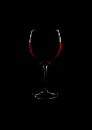 red wine and glass on black backgroundの写真素材