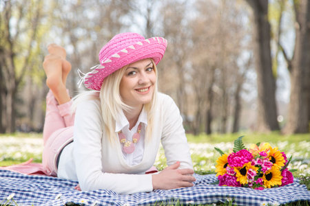 Beautiful teen blonde girl in park