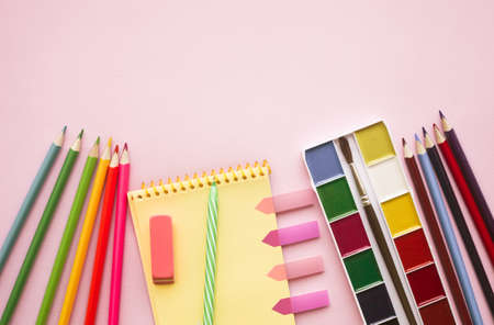 Back to school. Items for the school against pink background. Flat lay.の写真素材