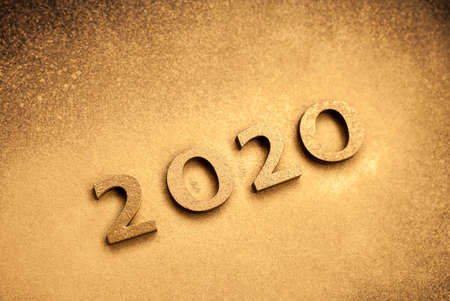 2020 New year golden number, shiny festive christmas and new year picture. Golden background.の写真素材