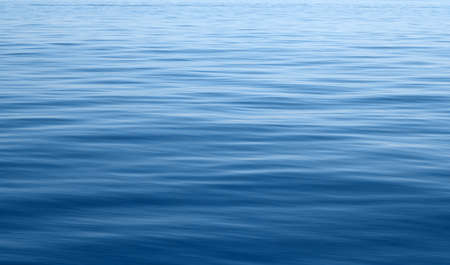Abstract natural 2020 year classic blue sea waves background. Trendy toneの写真素材