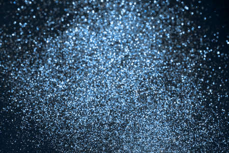 Color trendy blue glitter festive background. Sparkling glittering backdrop for design. 2020 trendの写真素材