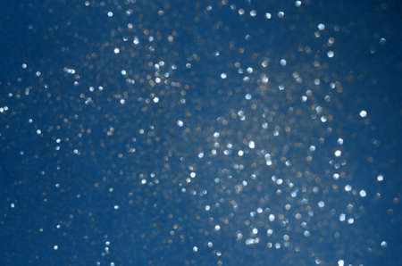 Color trendy blue glitter festive background. Sparkling glittering backdrop for design. 2020 trendの写真素材