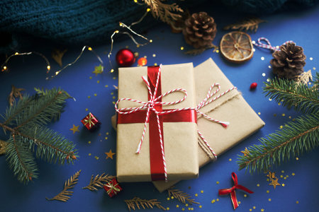 Stylish classic blue background and gift box for Christmas greeting card. Golden and blue star gold...