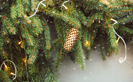 Close up of Christmas tree with lights and decorations, winter festive background, detailsの写真素材