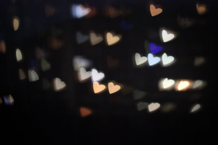 Overlay blurry background of golden hearts bokeh, for Valentine's or holidays card