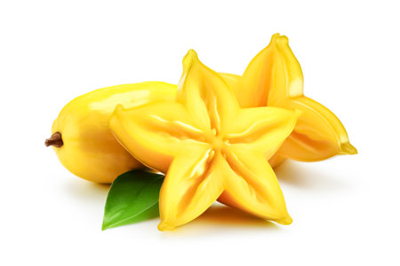Starfruit, carambola with green leaves isolated on white background.の素材
