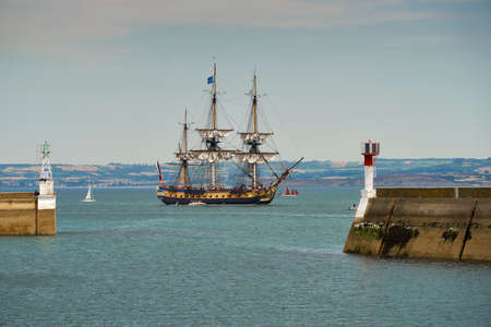 Douarnenez, France - July 19, 2016. French light frigate Hermione replica sailing into the harbor for the maritime festivalのeditorial素材
