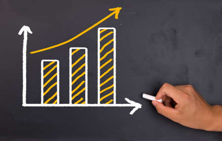 financial graph on blackboardの写真素材