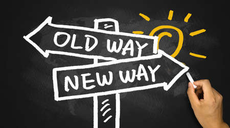 choose new way concept hand drawing on blackboard backgroundの写真素材