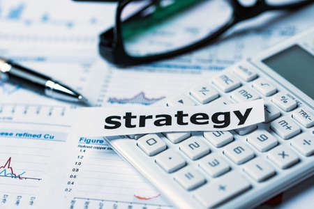 business strategy concept with financial graphs and chartsの写真素材