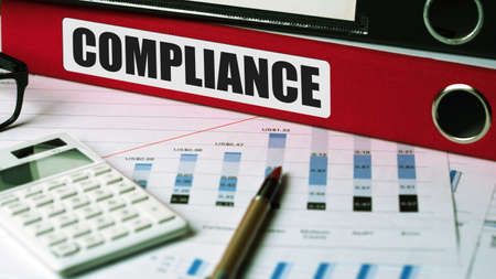 compliance concept on document folderの写真素材