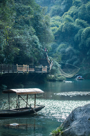 ancient fishing boat on yangtze riverの写真素材
