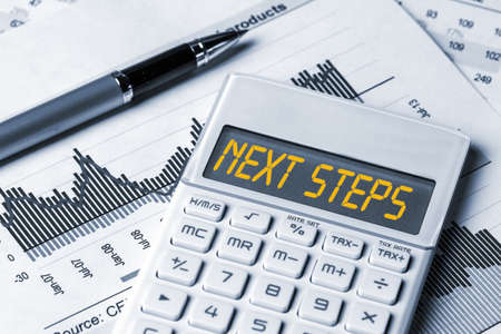 next steps displayed on calculatorの写真素材