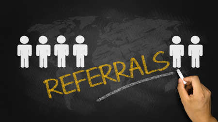 referrals concept handwritten on blackboardの写真素材