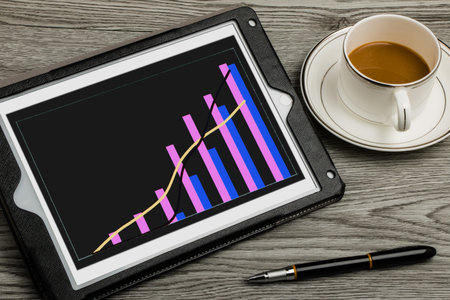 financial graph on touch screen background