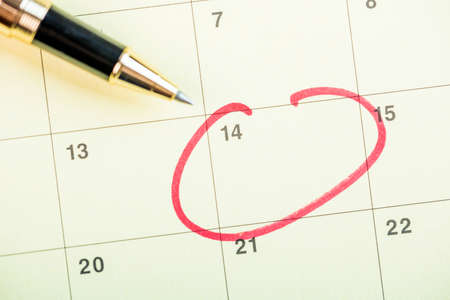 Pen on calendar with red circle. planning conceptの写真素材