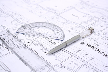 Drawing plan with ruler and square on it