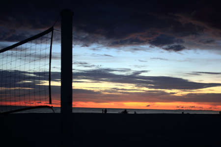 Volleyball net on the beach tonightの写真素材