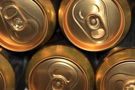 Aluminum pack of beer cansLots of metal barrels at a beer factoryの写真素材
