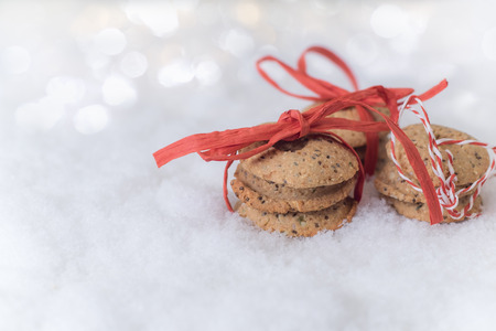 Healthy christmas cookies in the snowの写真素材