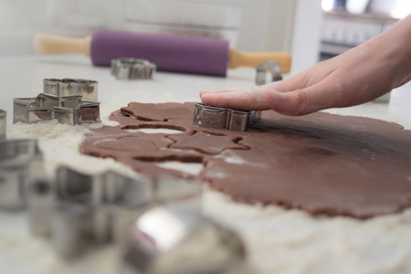 Cutting chocolate cookie doughの写真素材