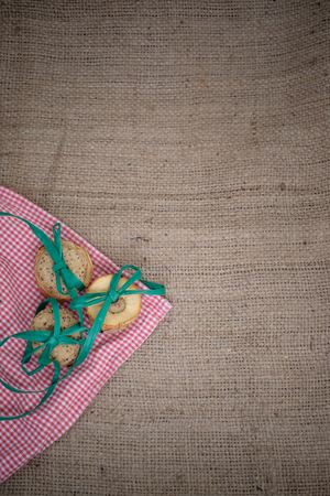 Healthy chia cookies on red white clothの写真素材