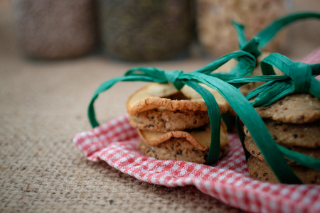Healthy chia cookies on red white clothの写真素材
