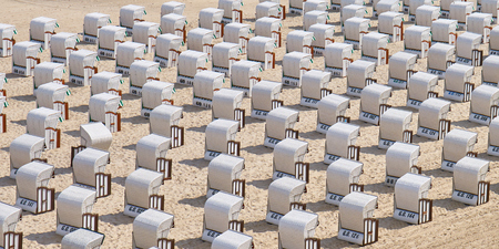 Beach chairs near Sallin Pier, Rugen, Germanyの写真素材