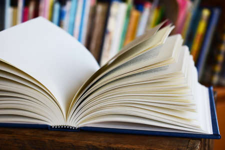 An open book in a libraryの写真素材