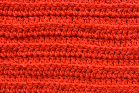a seamless orange crocheted texture