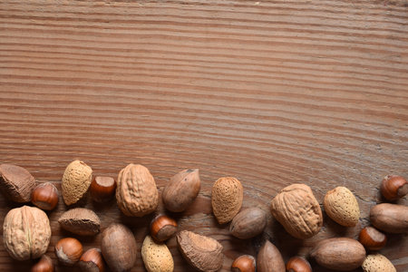 a horizontal of mixed nuts with copyspaceの写真素材