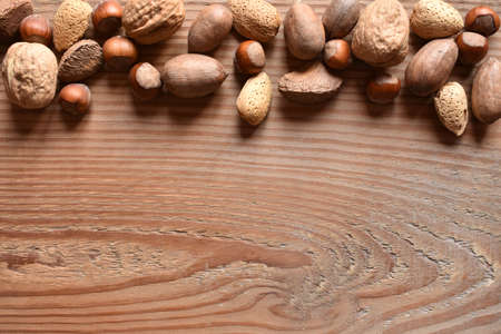 a horizontal of mixed nuts with copyspaceの写真素材