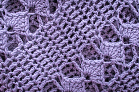 Purple crocheted blanket texture